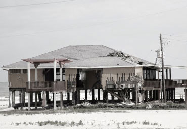 Wind damage - spray foam can help prevent uplift to Miramar roofs